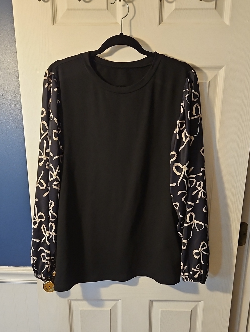 Women’s Black Top with Patterned Sleeves